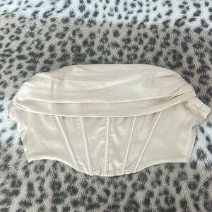 Never worn champagne cropped strapless top!